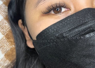 Close-up of eyelash extensions at Rein.House beauty in Bali, Bali, ID, showcasing detailed lash work.