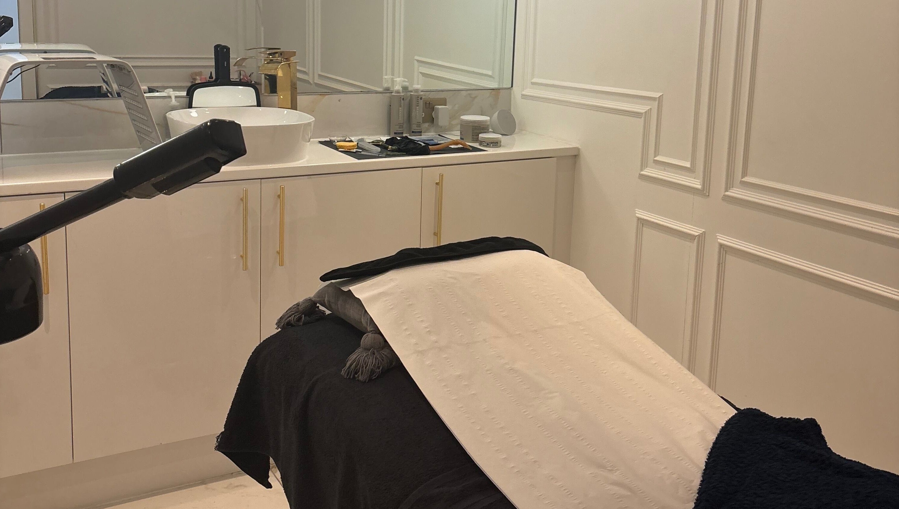 Elegant treatment room at By Chrissie Beauty, Bournemouth, England, GB with a sleek, modern design.