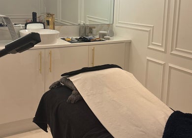 Elegant treatment room at By Chrissie Beauty, Bournemouth, England, GB with a sleek, modern design.