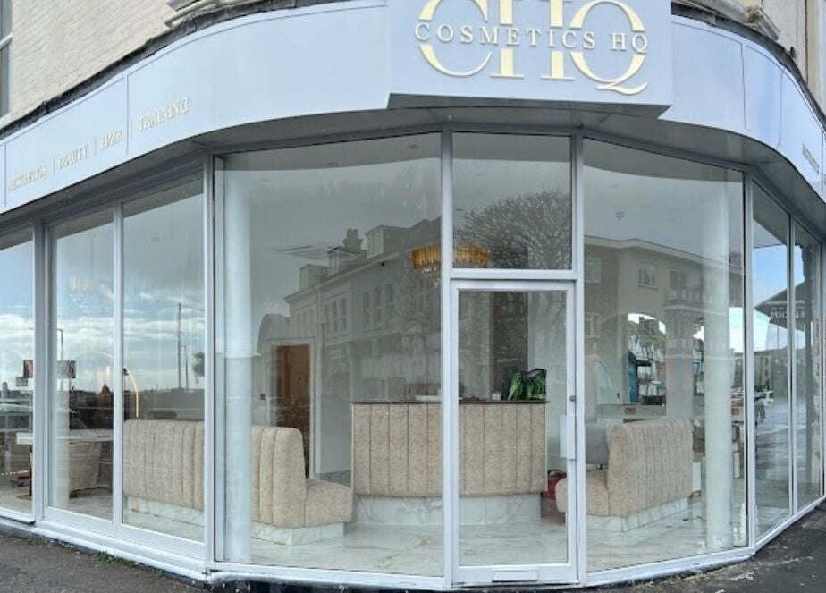 Stylish storefront of By Chrissie Beauty in Bournemouth, England, GB with glass windows.