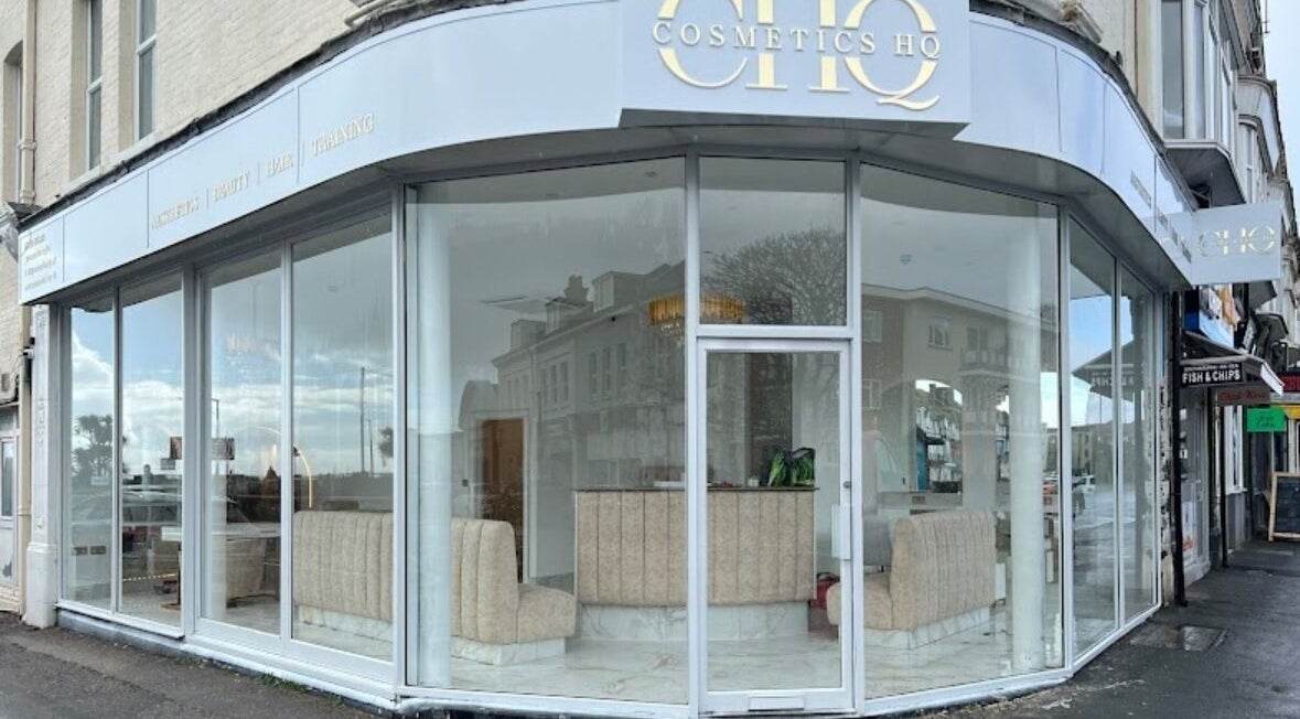 Stylish storefront of By Chrissie Beauty in Bournemouth, England, GB with glass windows.