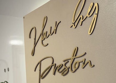 Hair by Preston sign in elegant font, Taunton, England, GB.
