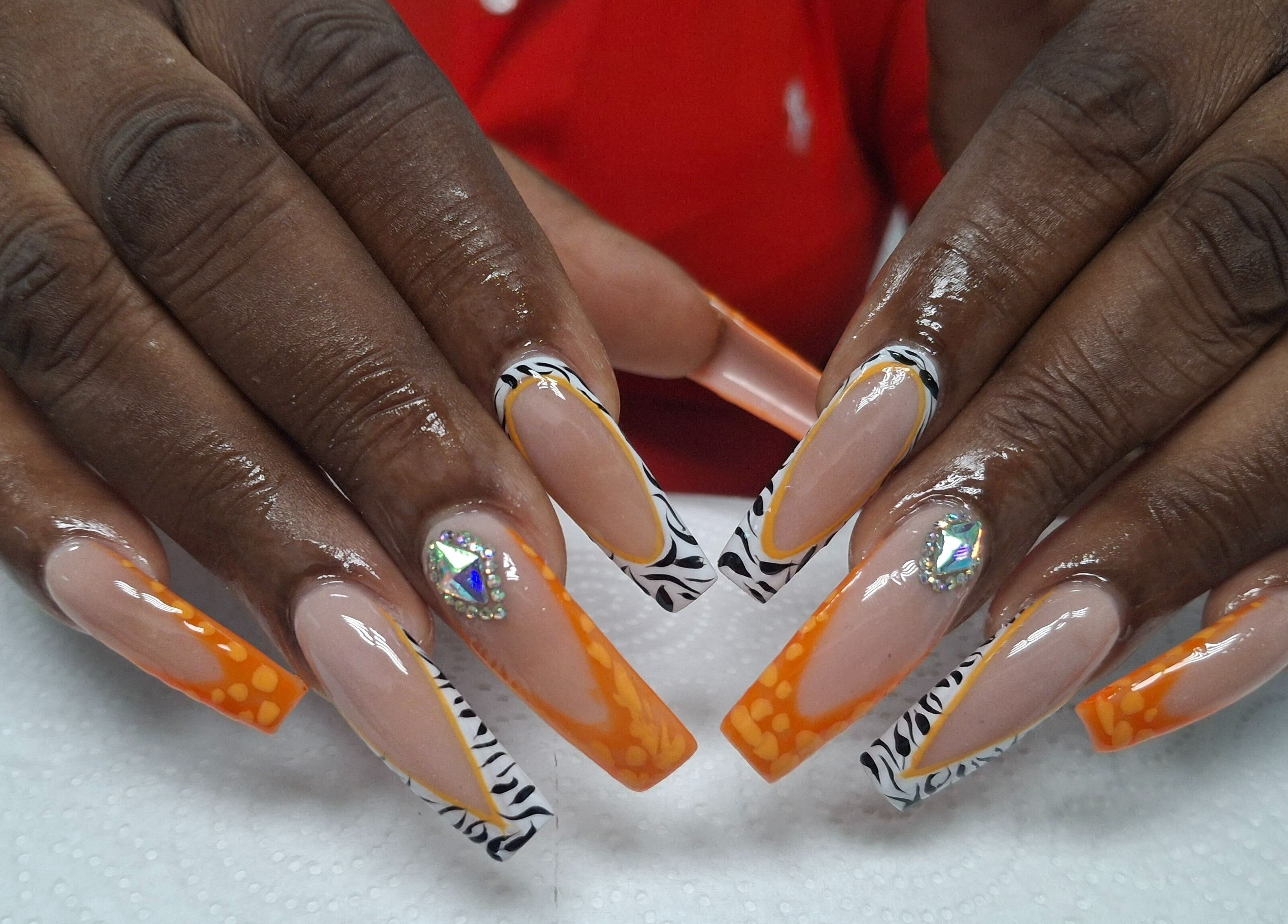 Stylish nail art design at Lisa Spa in Bridgetown, Saint Michael, BB. Vibrant colors and intricate patterns.
