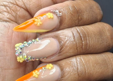 Bright orange and gem-embellished nails designed at Lisa Spa, Bridgetown, Saint Michael, BB.