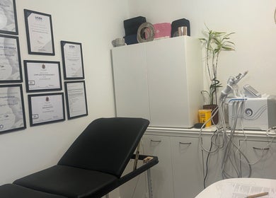 Treatment room at Naz Aesthetics, Manchester, England, GB with certifications and advanced equipment.
