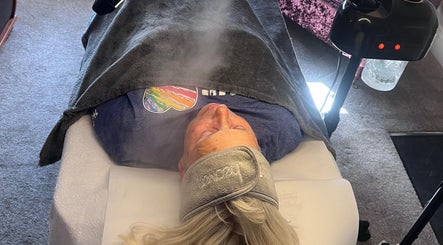 Client enjoying facial steam treatment at Honey Glow Skincare in Broseley, England, GB.