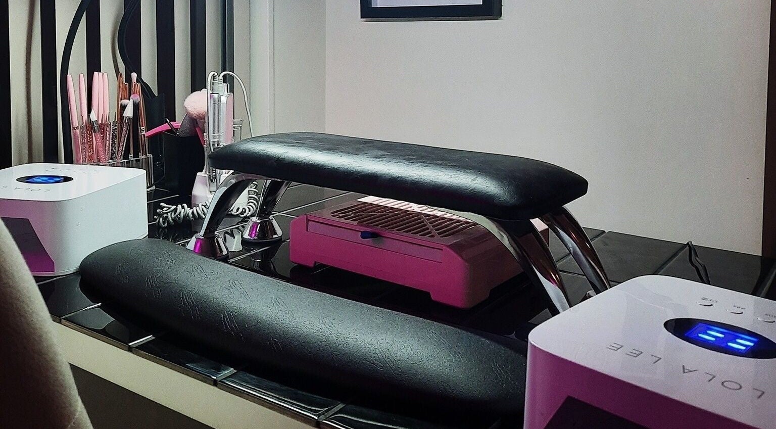 Modern nail station at Straight Up Nails, Auckland, Auckland, NZ showcasing tools and equipment.