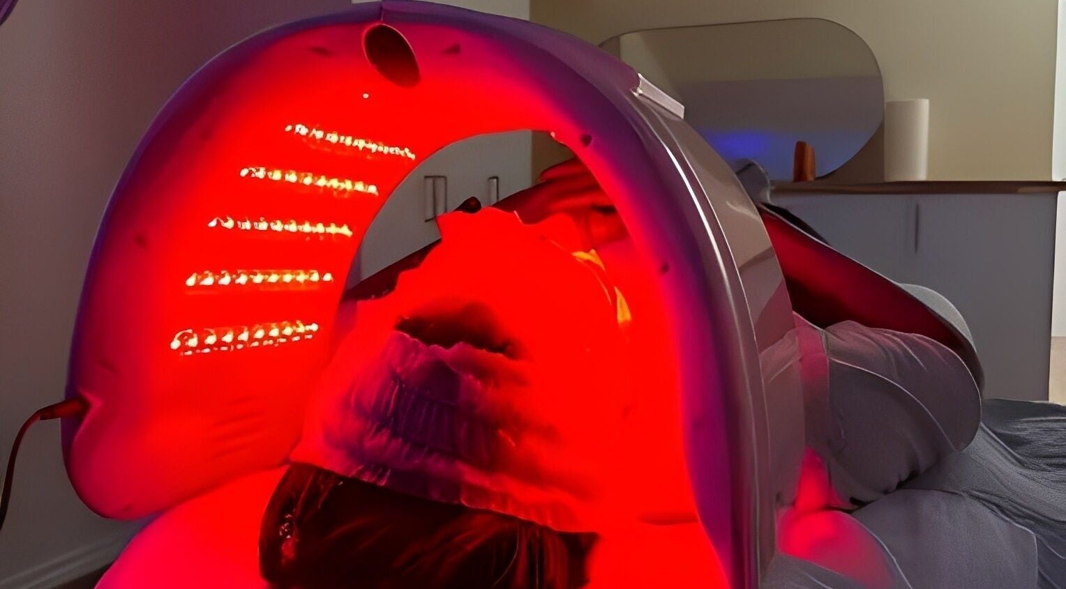 LED light therapy session at LAYORA AESTHETICS, Toronto, Ontario, CA, promoting skin health and relaxation.