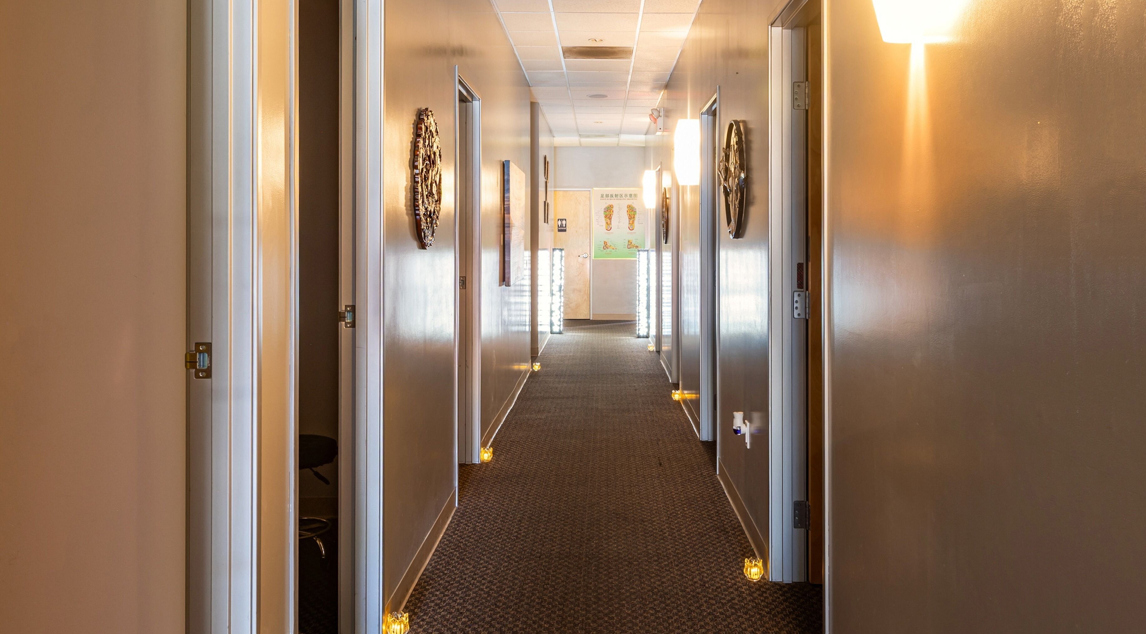Tranquil hallway at Elation Massage & Spa - San Diego, California, US, warmly lit and inviting.