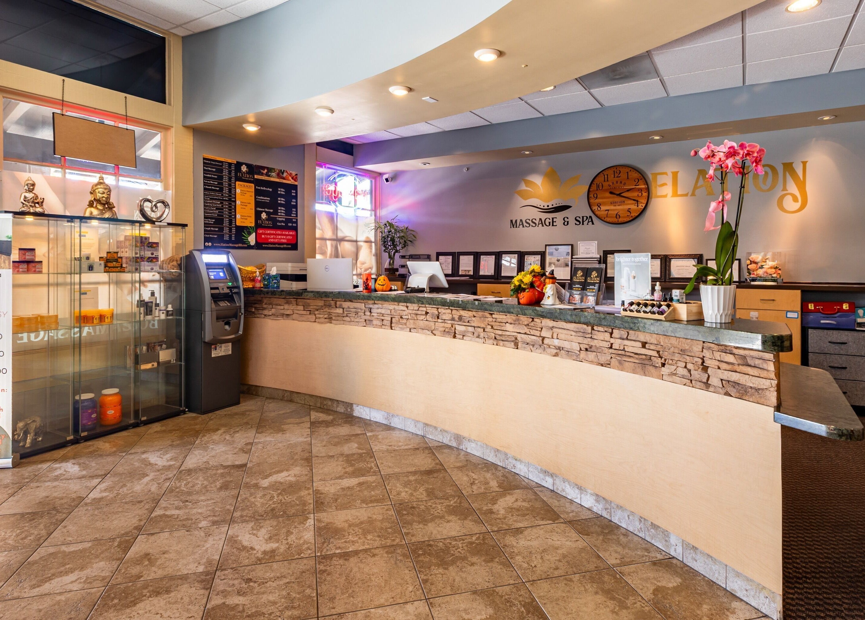 Reception area of Elation Massage & Spa - San Diego with elegant decor. San Diego, California, US.