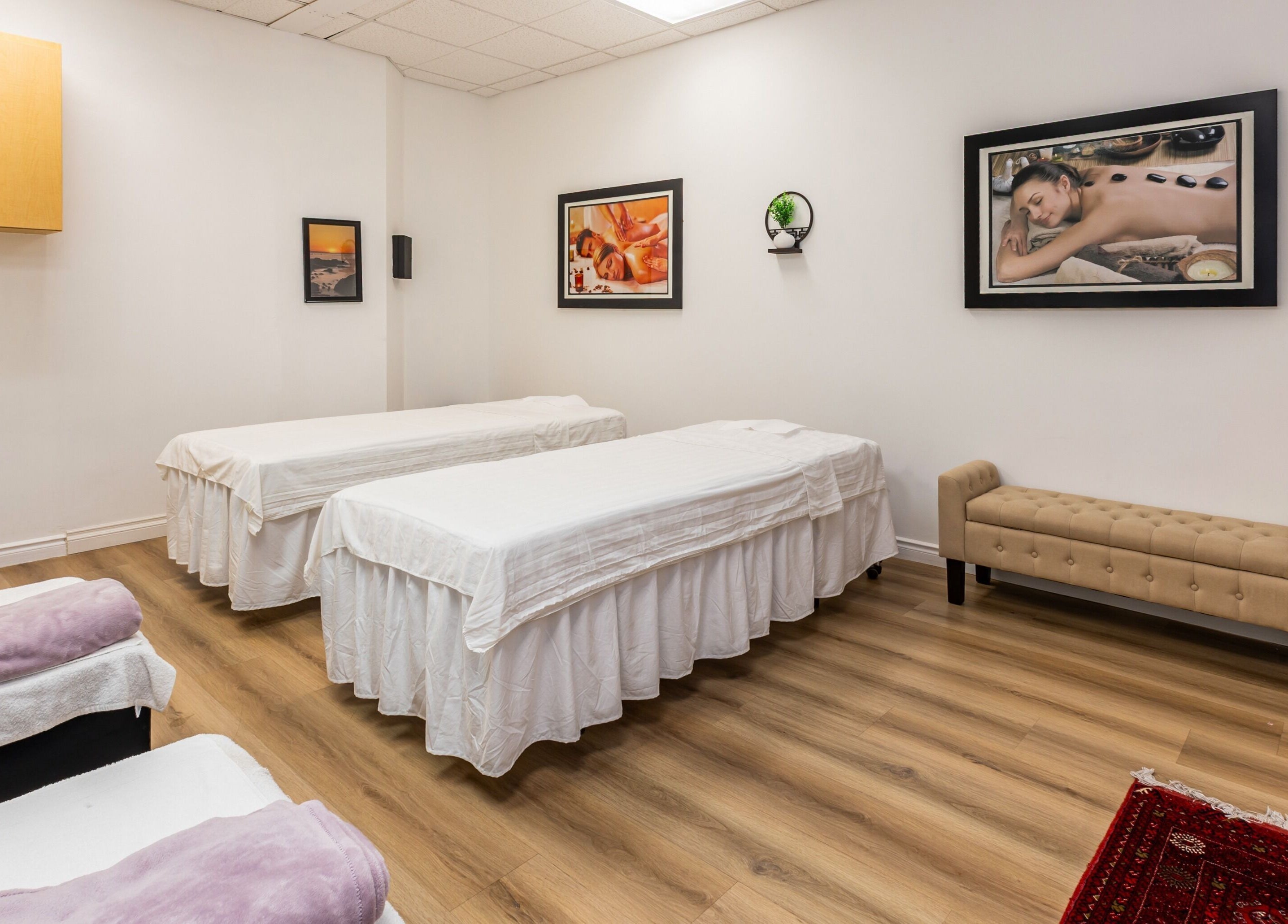 Elegant treatment room at Elation Massage & Spa - San Diego, California, US, with two massage tables.