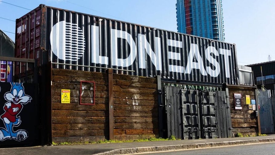 Unique shipping container venue near Narasdreamhouse, London, England, GB, embraced by urban art.