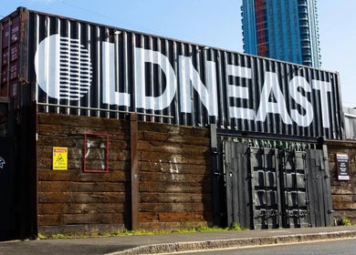 Unique shipping container venue near Narasdreamhouse, London, England, GB, embraced by urban art.