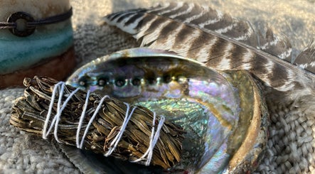 Smudging kit with sage and feather at Arise Alight Healing Arts, Adrian, Michigan, US, enhancing wellness.