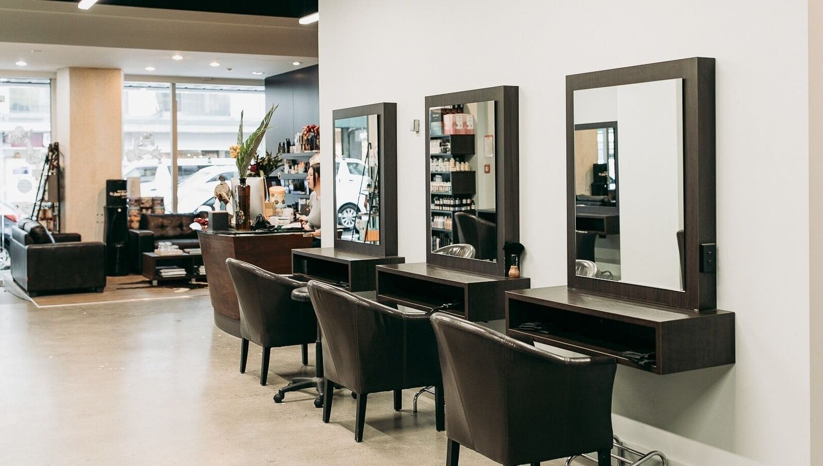 Modern salon interior at Sable in Wellington, Wellington Region, NZ with sleek styling stations.