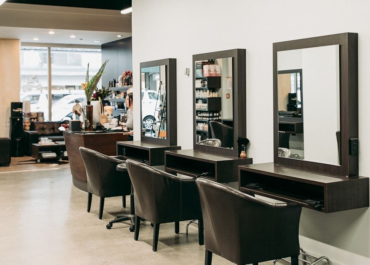Modern salon interior at Sable in Wellington, Wellington Region, NZ with sleek styling stations.