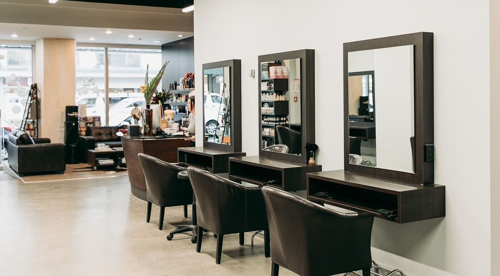 Modern salon interior at Sable in Wellington, Wellington Region, NZ with sleek styling stations.
