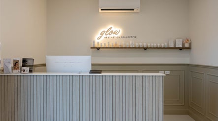 Reception area of Glow Aesthetics Collective in Ingle Farm, South Australia, AU with product display.