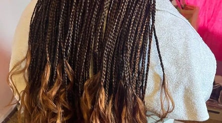 Intricate braids styled at House of Grace Beauty Salon, Johannesburg, Gauteng, ZA.