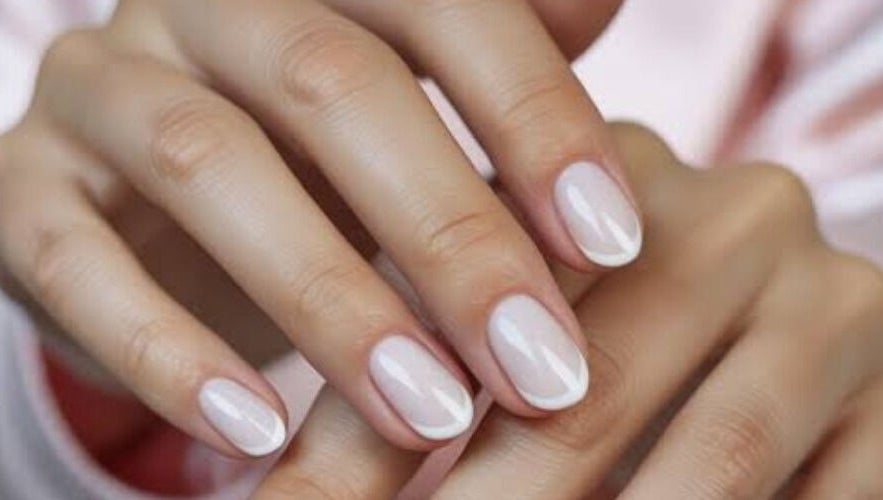 French manicure at Nail Aesthetics by Jamie in Somerset West, Western Cape, ZA, showcasing glossy, refined nails.