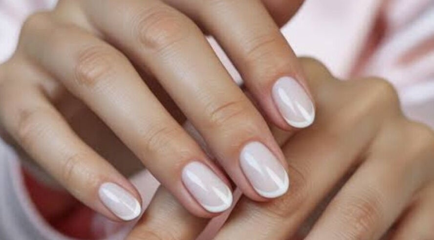 French manicure at Nail Aesthetics by Jamie in Somerset West, Western Cape, ZA, showcasing glossy, refined nails.