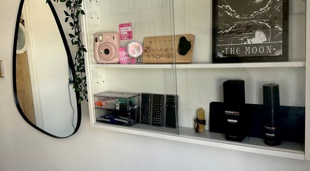 Stylish display at Durose Piercing, Portsmouth, England, GB featuring piercing jewelry and decor.