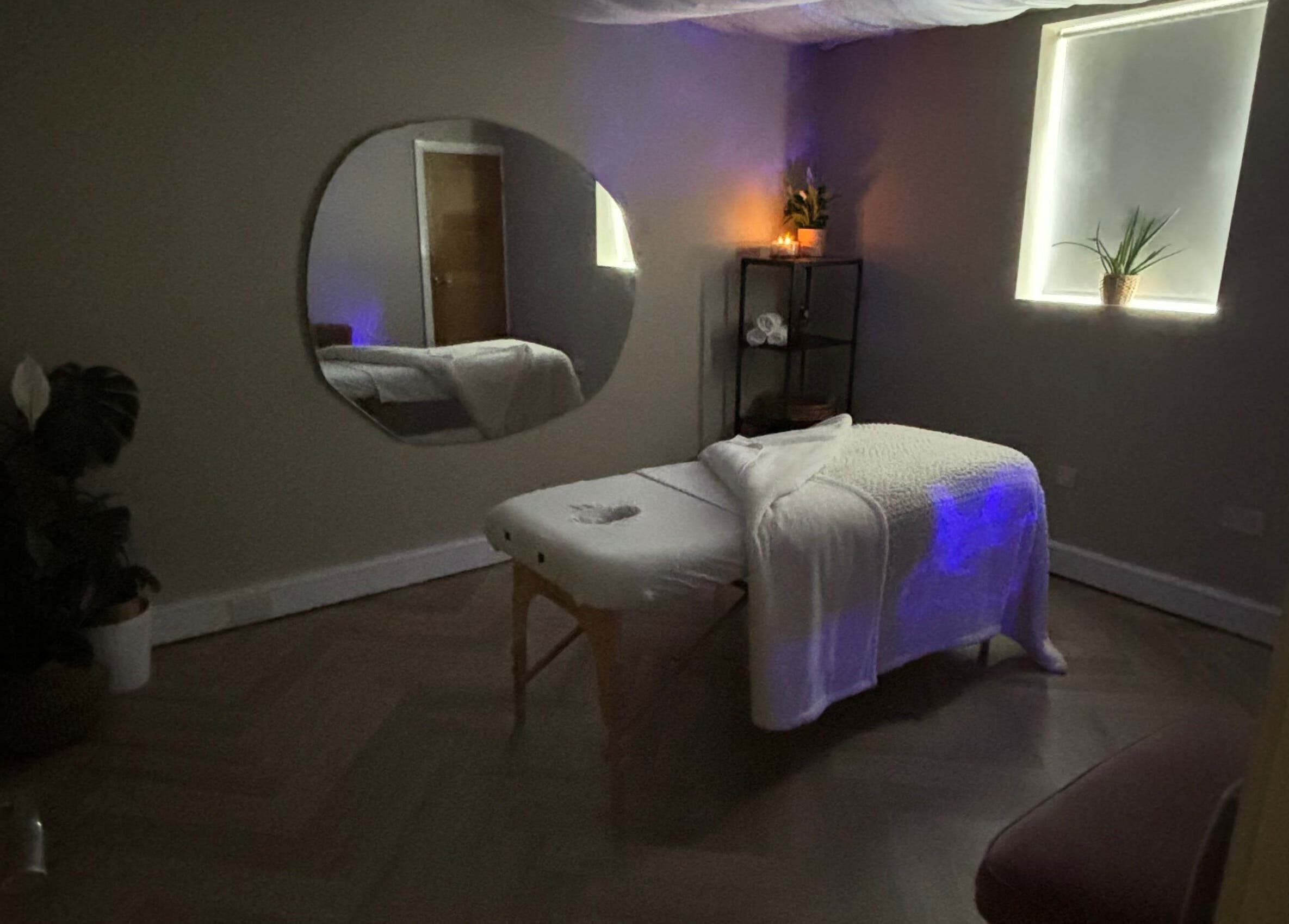 Relaxing massage room at Conscious Company, Stalybridge, England, GB, featuring a tranquil ambiance and cozy decor.