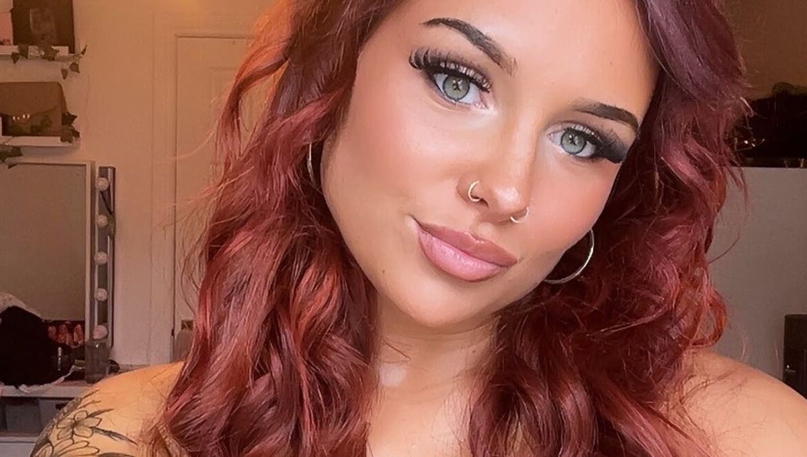 Woman with vibrant hair and makeup at KSP beauty bar in Banchory, Scotland, GB.