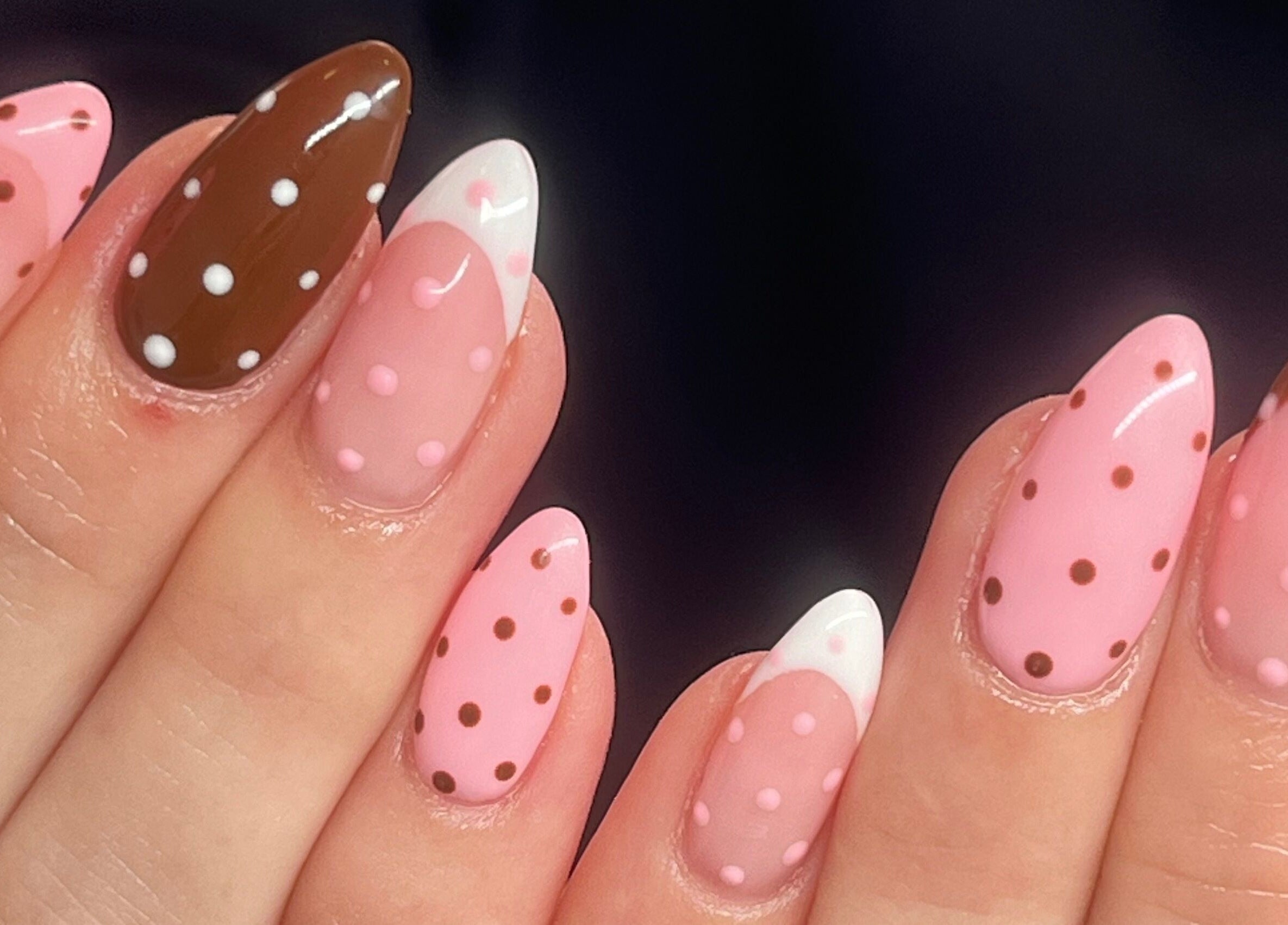 Colorful polka dot nail art at KSP beauty bar, Banchory, Scotland, GB showcasing vibrant design.