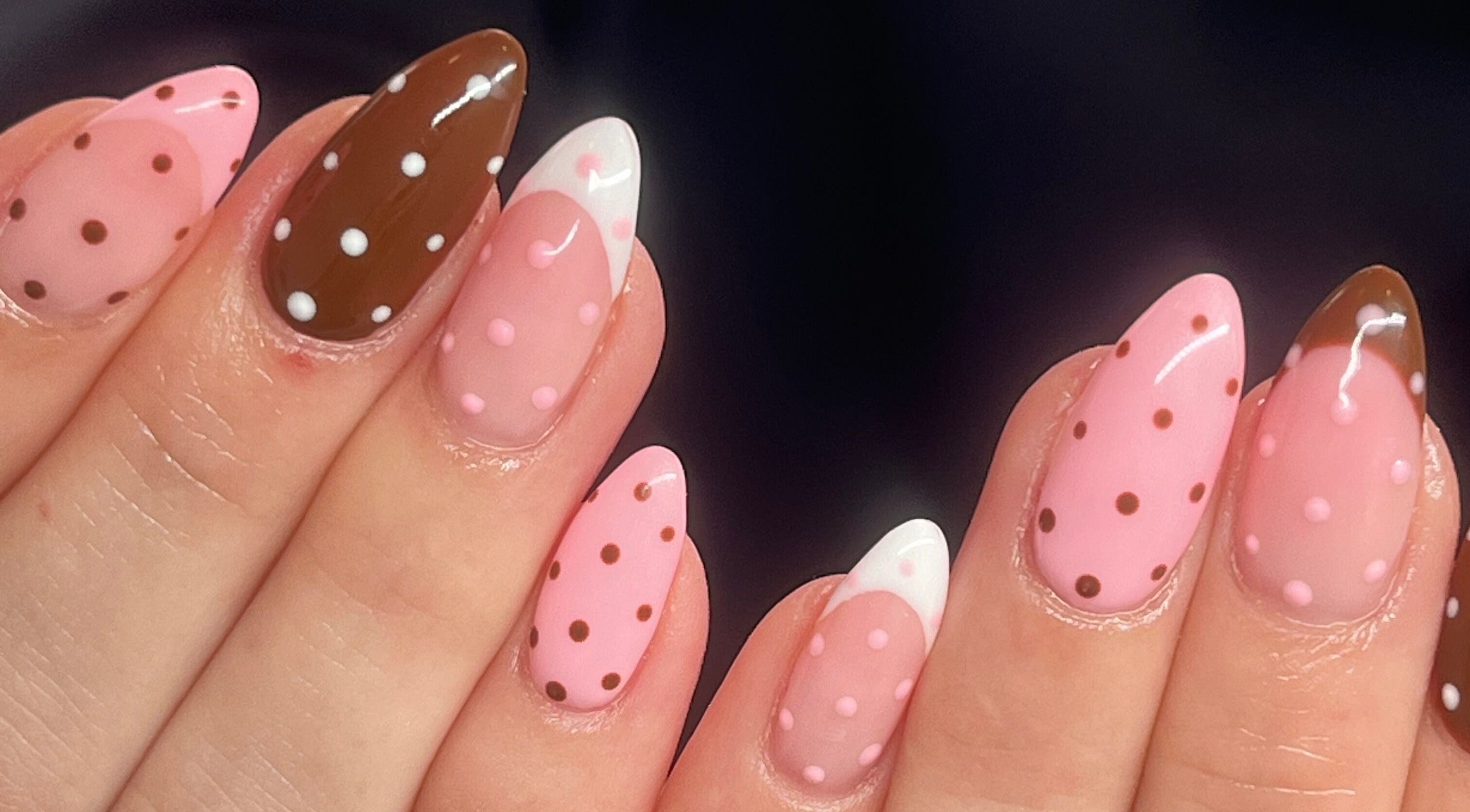 Colorful polka dot nail art at KSP beauty bar, Banchory, Scotland, GB showcasing vibrant design.