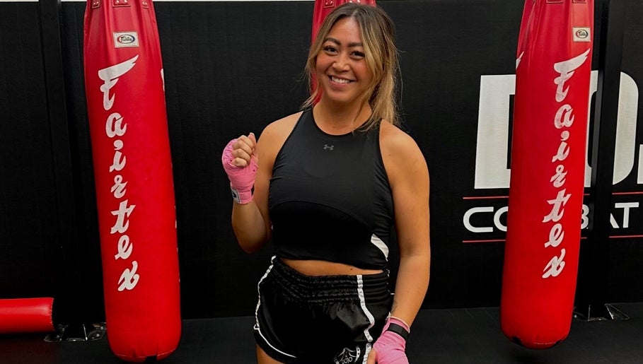 Fitness coach at Honor: Women's Online Fitness Coach, Worksop, England, GB, with boxing gloves.