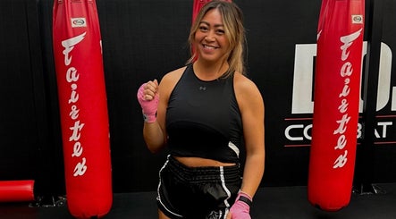 Fitness coach at Honor: Women's Online Fitness Coach, Worksop, England, GB, with boxing gloves.