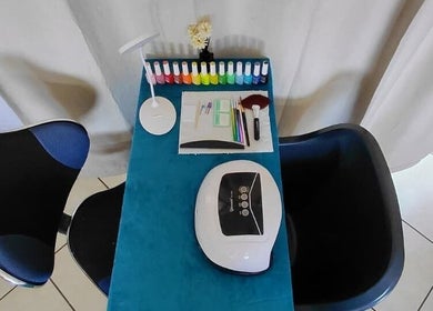 Nail station with colorful polish at Nails By Shaaquila, Roodepoort, Gauteng, ZA, ready for a manicure.