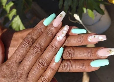 Elegant pastel nail art at Nails By Shaaquila, Roodepoort, Gauteng, ZA. Mint green with white accents.