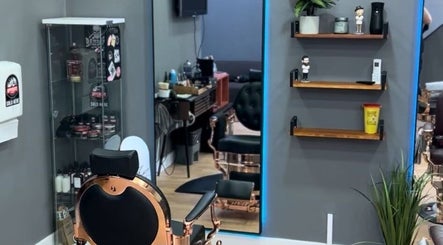 Chic interior of Fifteencut Barbershop, Portimão, Faro, PT showcasing elegant barber chairs and modern decor.