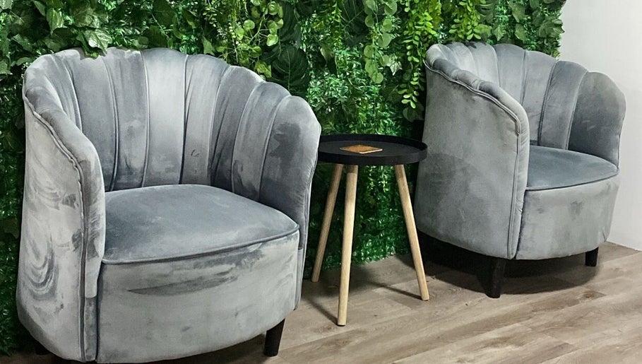 Elegant grey chairs and table at Top Coated Lounge, Somerset West, Western Cape, ZA.
