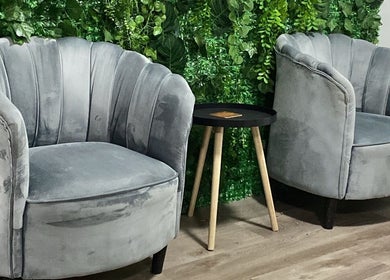Elegant grey chairs and table at Top Coated Lounge, Somerset West, Western Cape, ZA.