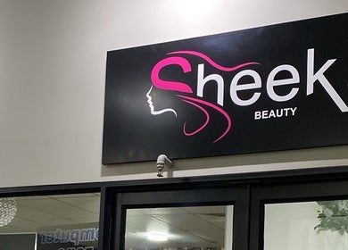 Signage of Top Coated Lounge at Somerset West, Western Cape, ZA, showcasing elegant design.