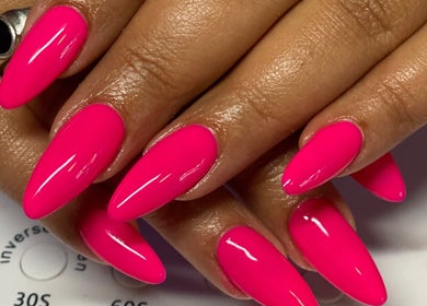 Bright pink manicured nails at Top Coated Lounge, Somerset West, Western Cape, ZA.