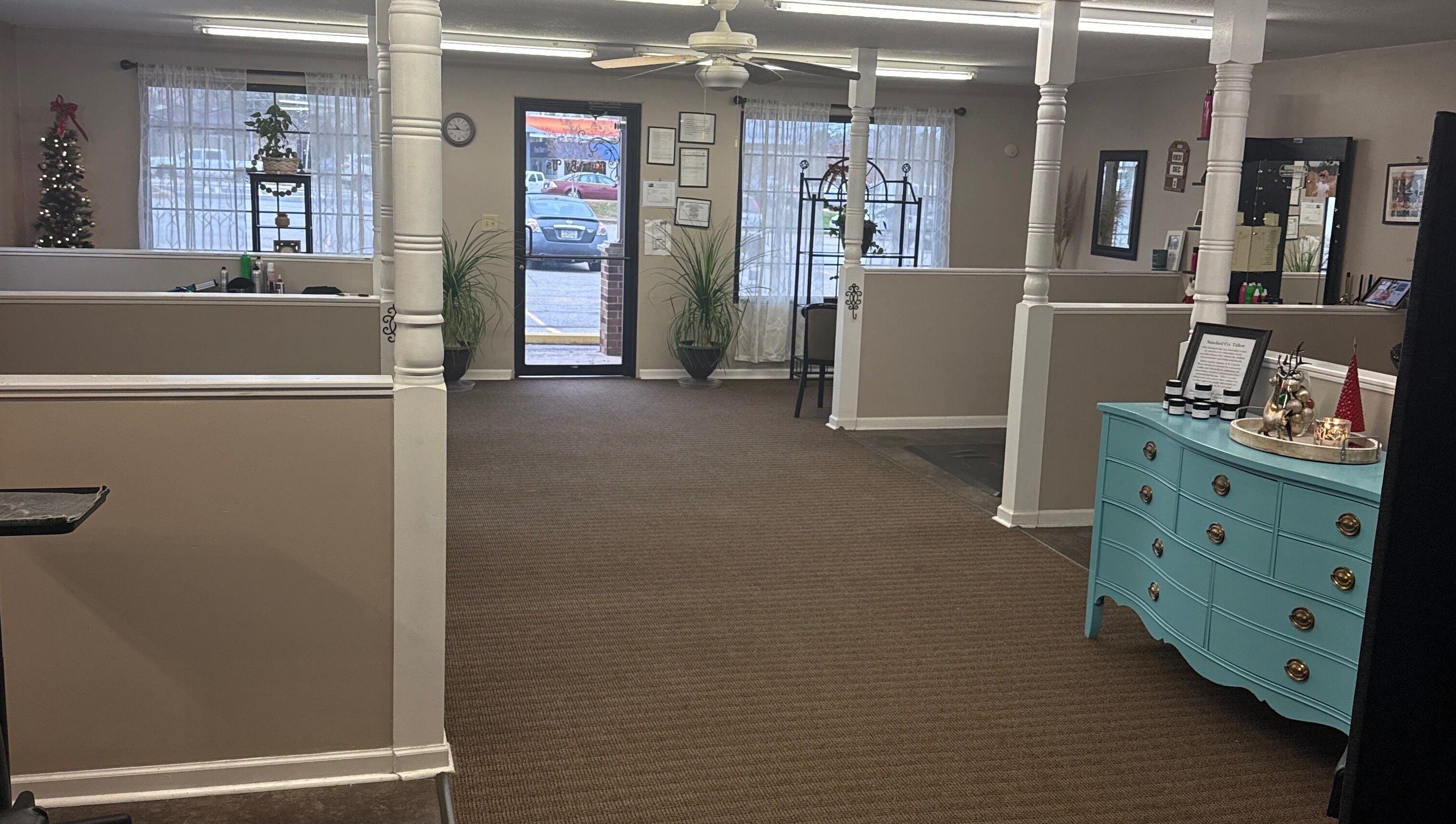 Inviting lobby of Kutz By Us, Thomaston, Georgia, US, featuring comfy seating and modern decor.