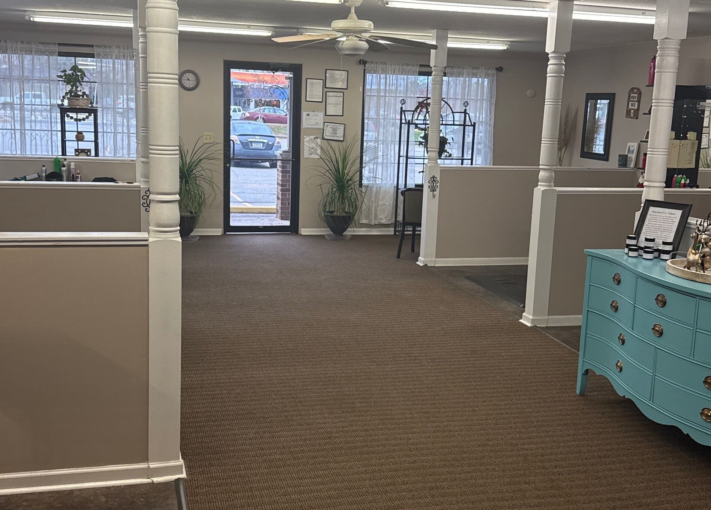 Inviting lobby of Kutz By Us, Thomaston, Georgia, US, featuring comfy seating and modern decor.