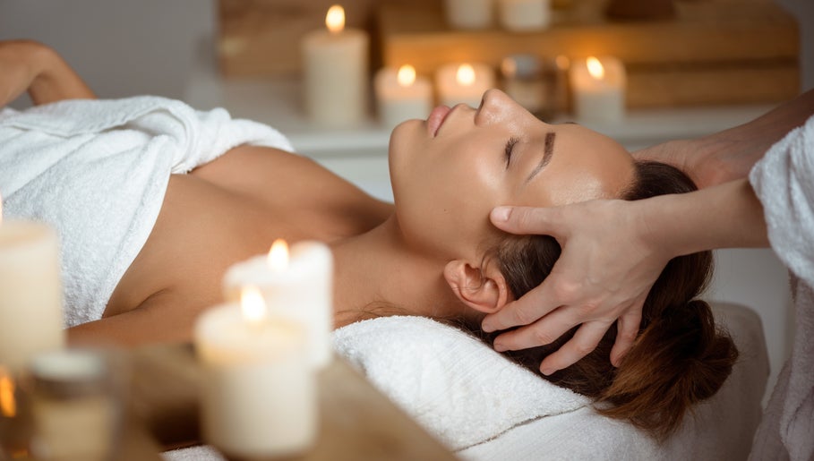 Relaxing massage at Life Holistics, North Shields, England, GB, surrounded by soothing candlelight.