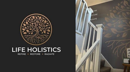 Entrance with Life Holistics logo and decor at North Shields, England, GB. Elegant stairway with tree motif.