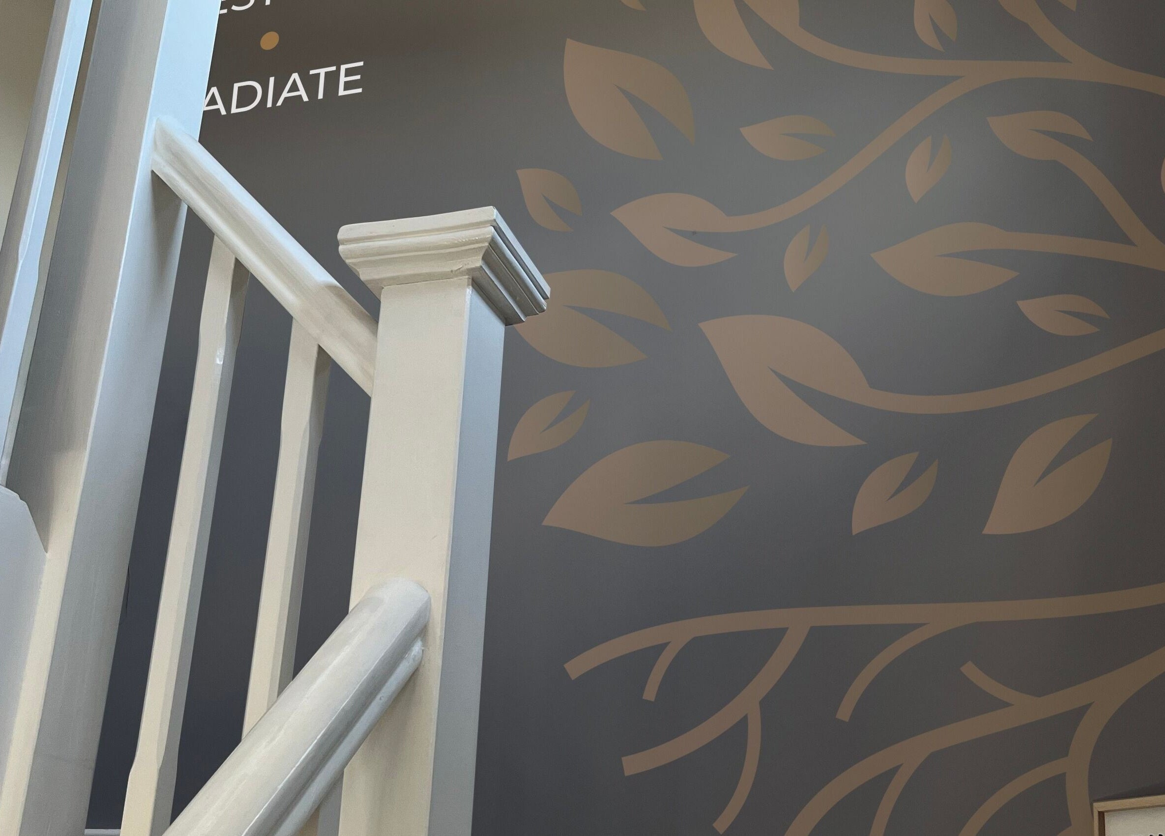 Artistic leaf mural on wall beside stairway at Life Holistics, North Shields, England, GB.