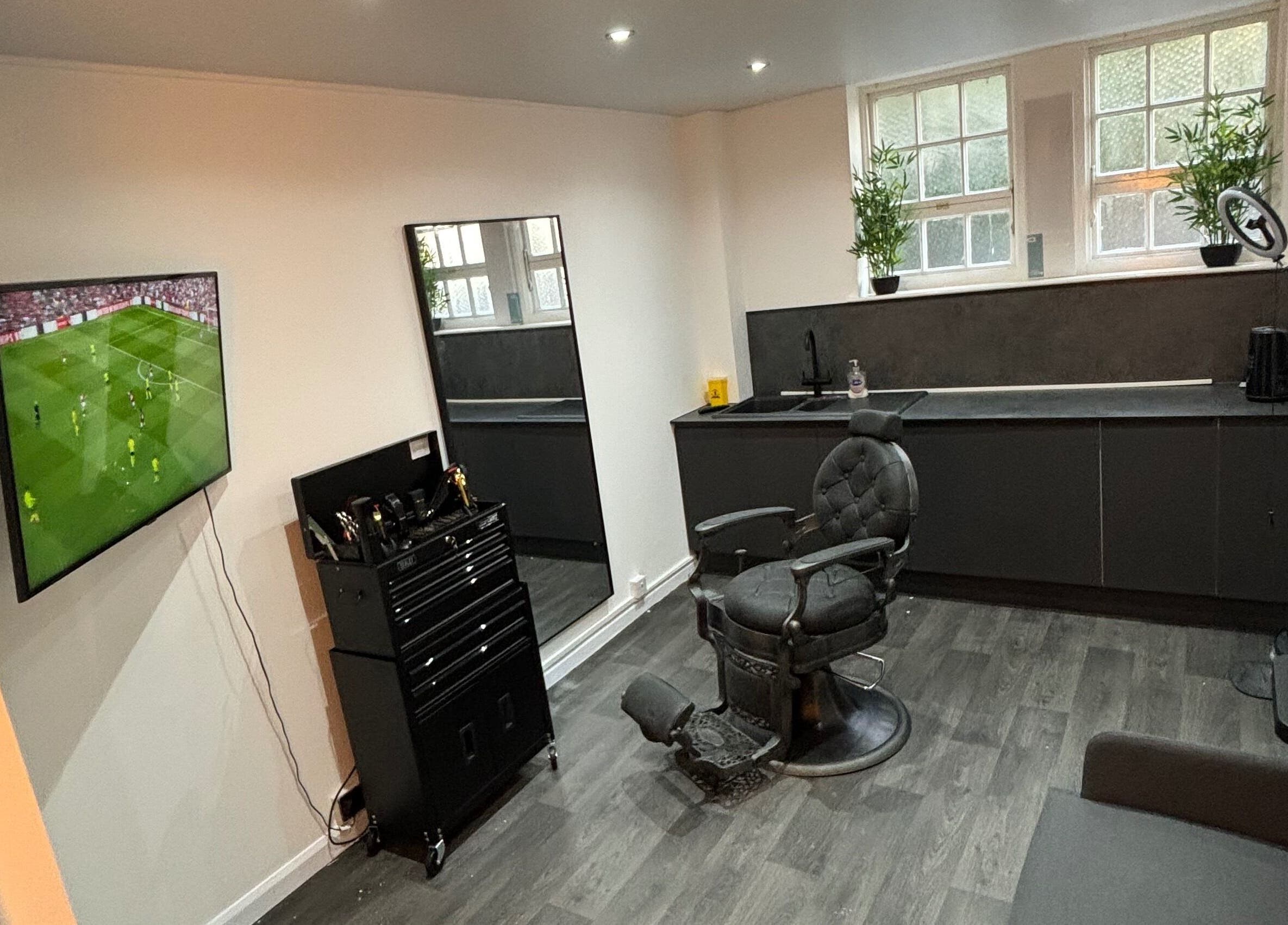Modern barber chair setup in Snakebite Barbers, Hartlepool, England, GB featuring sleek interiors.