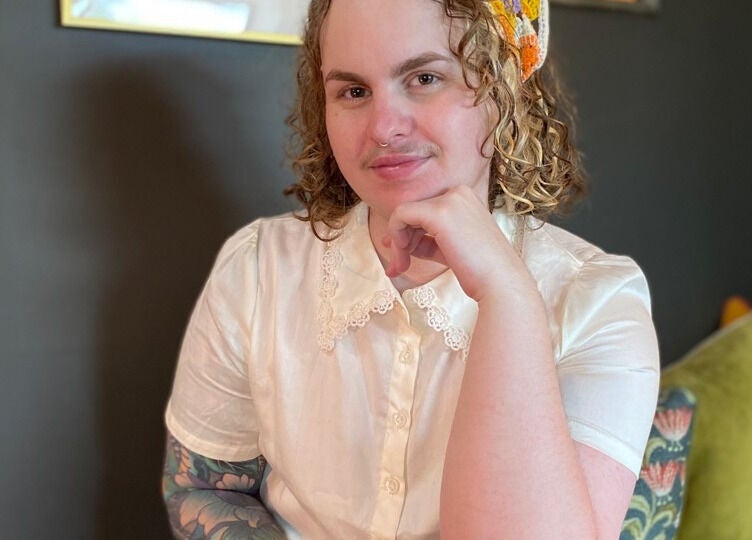 Person in white shirt sitting at Studio D.E.W, West End, Queensland, AU.