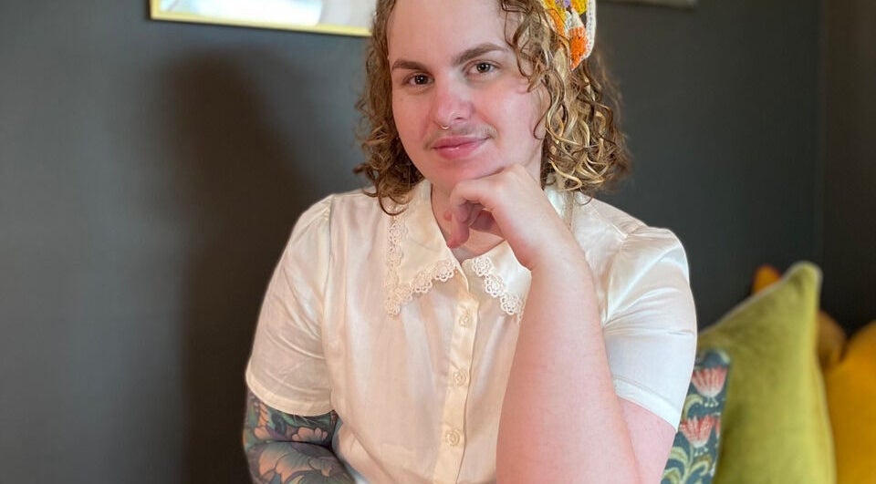 Person in white shirt sitting at Studio D.E.W, West End, Queensland, AU.