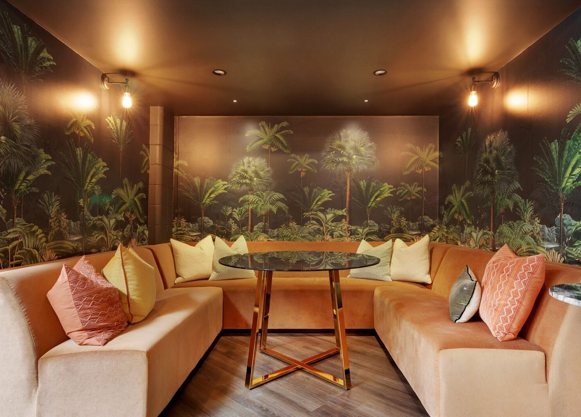 Elegant lounge area with palm wallpaper at Studio D.E.W in West End, Queensland, AU.