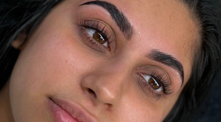 Close-up of beautifully shaped eyebrows and long lashes at BeautyByIz, Bramley, England, GB.