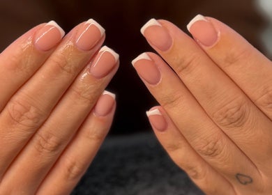 French manicure at BeautyByIz in Bramley, England, GB. Chic white tips on polished nails.